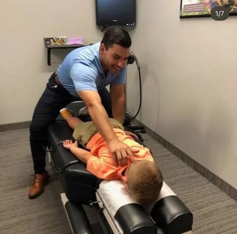 A gentle pediatric adjustment at Explore Family Chiropractic in Aurora, Ohio
